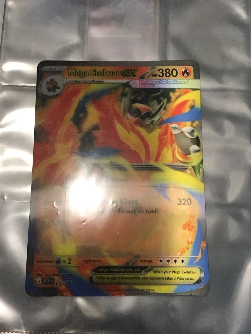 Mega Emboar EX Holographic Pokémon Card - Orange, Yellow, Red